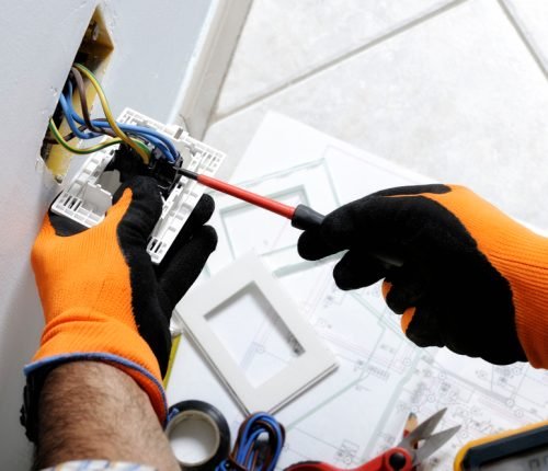 Electrician,Working,Safely,On,Switches,And,Sockets,Of,A,Residential